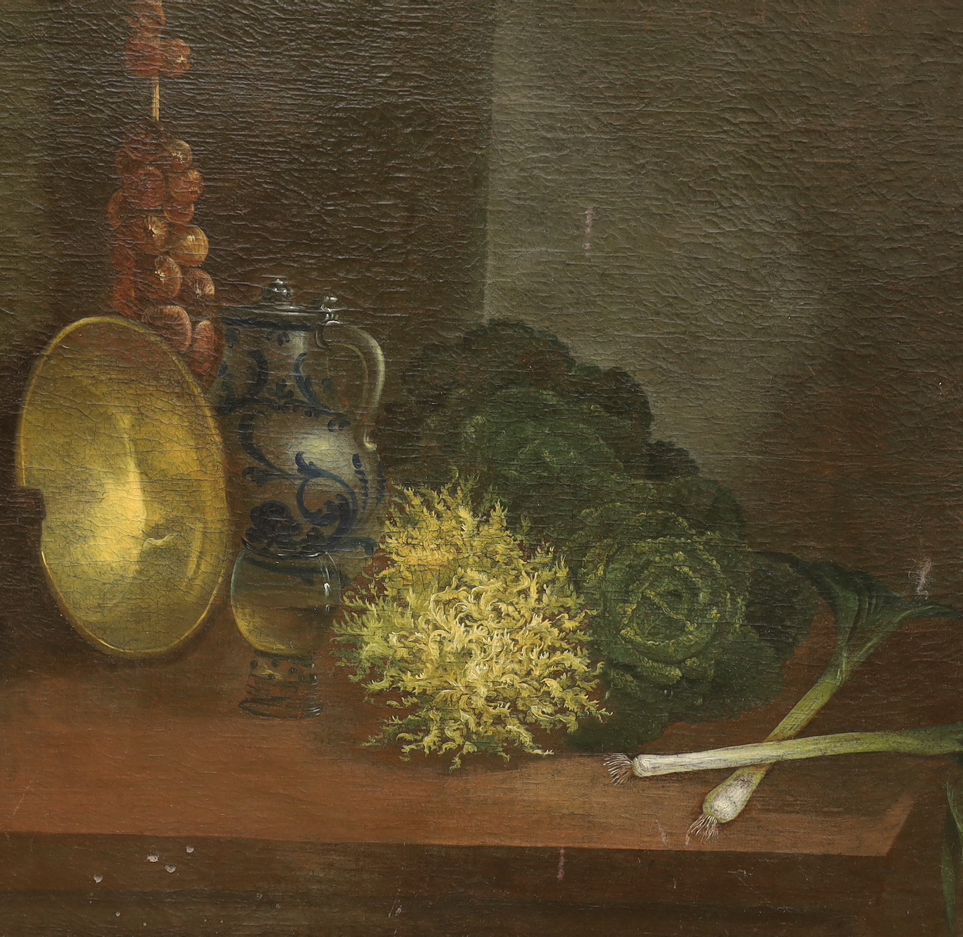 19th century Continental School, oil on canvas, Still life of vegetables, a faience flagon and a rummer, 86 x 93cm, unframed